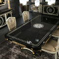 Sophisticated Black and Gold Dining Table with Mirrored Accents