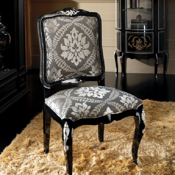 Luxurious Black Tufted Dining Chair with Ornate Accents