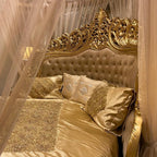 Grand Round Bed with Velvet Upholstery and Golden Accents