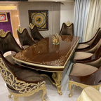 Luxurious Leather Upholstered Dining Chairs with Gold Leaf Accents