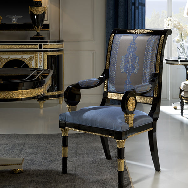 Elegant Upholstered Armchair with Classic Detailing