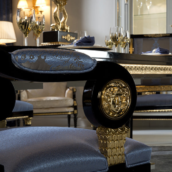 Elegant Upholstered Armchair with Classic Detailing