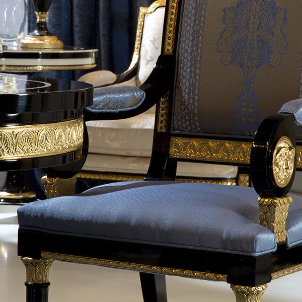 Elegant Upholstered Armchair with Classic Detailing