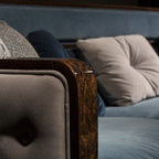 Elegant Blue Sofa with Artistic Touches