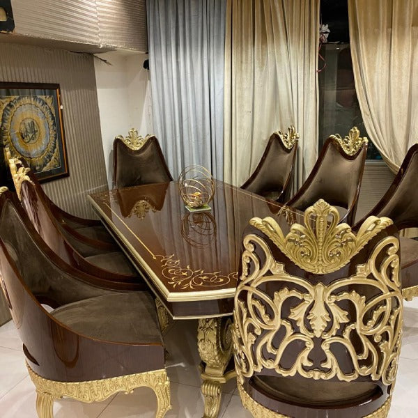 Luxurious Leather Upholstered Dining Chairs with Gold Leaf Accents