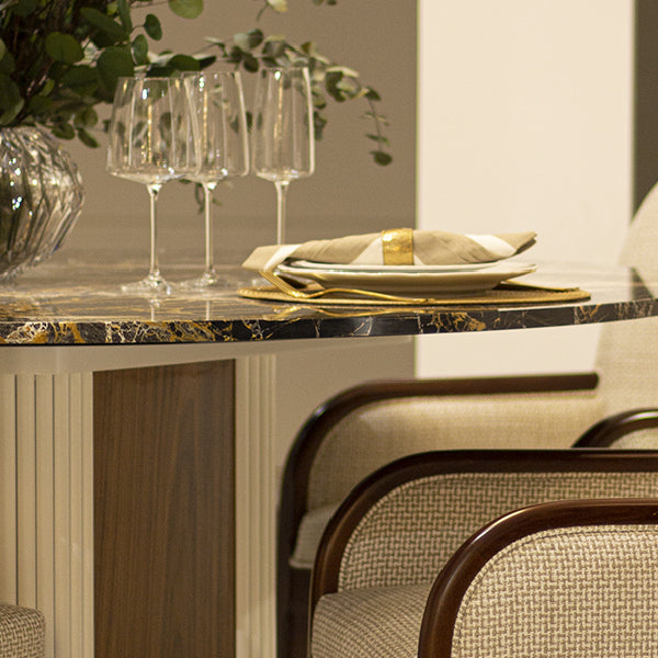 Sophisticated Round Dining Table with Marble Top and Textured Base