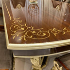 Luxurious Leather Upholstered Dining Chairs with Gold Leaf Accents