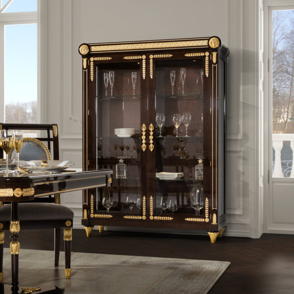 Elegant Display Cabinet with Glass Doors and Decorative Accents