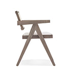 Stylish Cane Back Armchair with Dark Wood Frame and Plush White Cushion