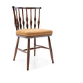 Elegant Walnut Dining Chair with Spindle Back Design and Warm Mustard Upholstery