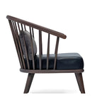 Modern Elegance: The Black Upholstered Accent Chair with Wooden Spindle Back