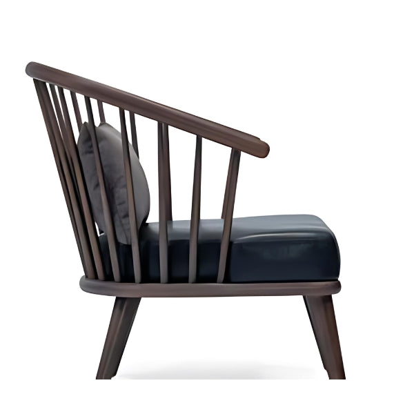 Modern Elegance: The Black Upholstered Accent Chair with Wooden Spindle Back