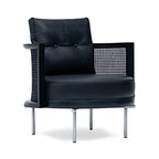 Modern Elegance: The Black Upholstered Accent Chair with Rattan Detail