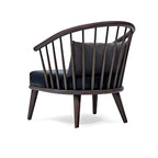 Modern Elegance: The Black Upholstered Accent Chair with Wooden Spindle Back