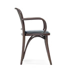 Chic Black Upholstered Armchair with Rattan Back and Dark Wood Frame: A Stylish Fusion of Comfort and Modern Design