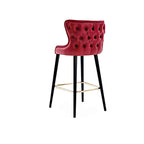 Bold Elegance: The Red Upholstered Bar Stool with Gold Accents