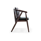 Stylish Dark Wood Armchair with Cushioned Seat and Decorative Pillow