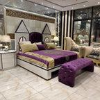 Royal Purple Velvet Bed with Golden Accents and Castle-Shaped Headboard