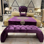 Royal Purple Velvet Bed with Golden Accents and Castle-Shaped Headboard