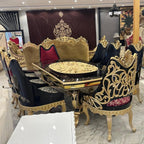 Royal Dining Table with Intricate Carvings and Matching Chairs