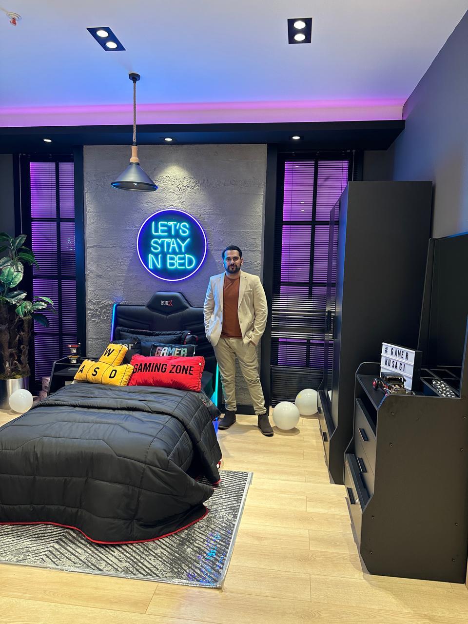 Modern Gaming Bedroom Set with LED Lighting, Ergonomic Chair, and Gaming Themed Decor for Gamers