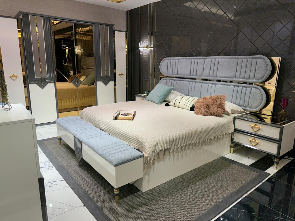 Elegant Modern Bedroom Suite with Plush Upholstery and Chic Accents
