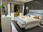 Elegant Modern Bedroom Suite with Plush Upholstery and Chic Accents
